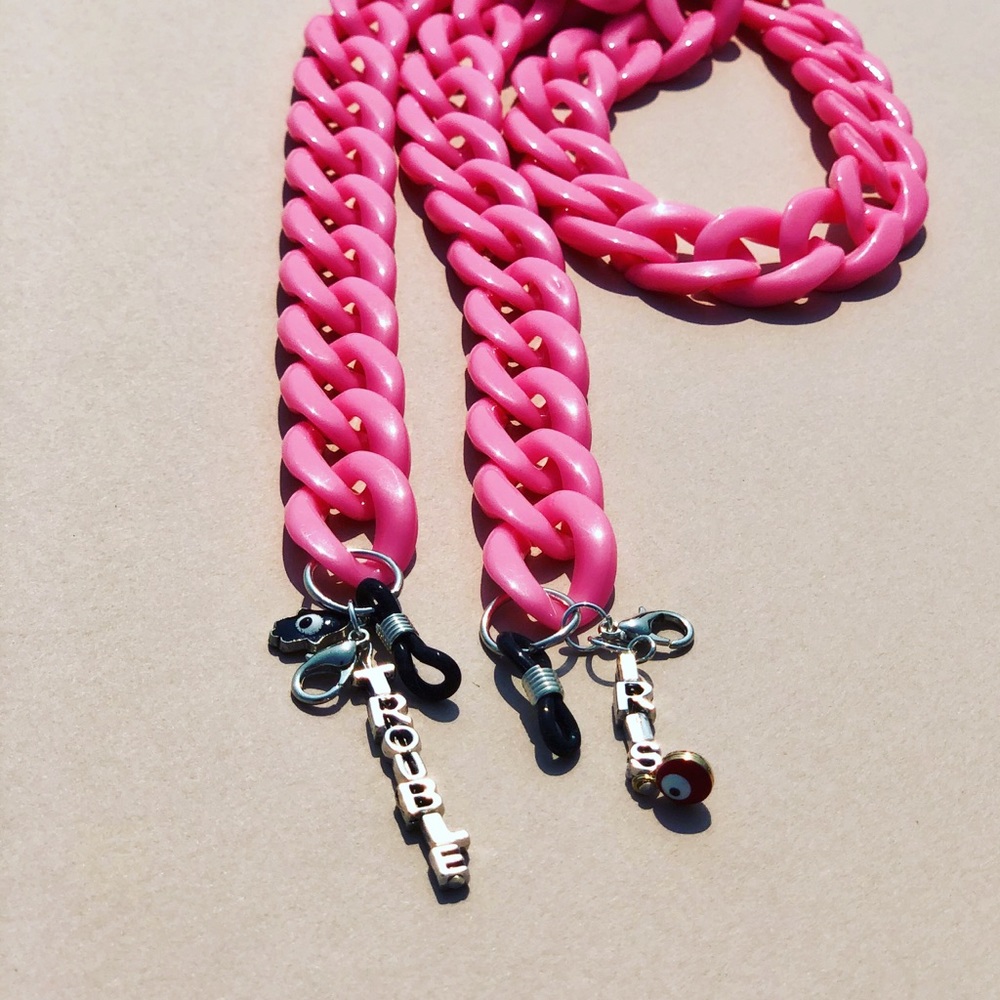 Sale: Two acrylic mask chains the charm offensive